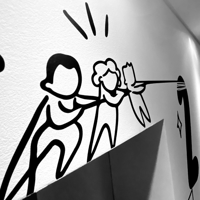 wall with illustrations of wow